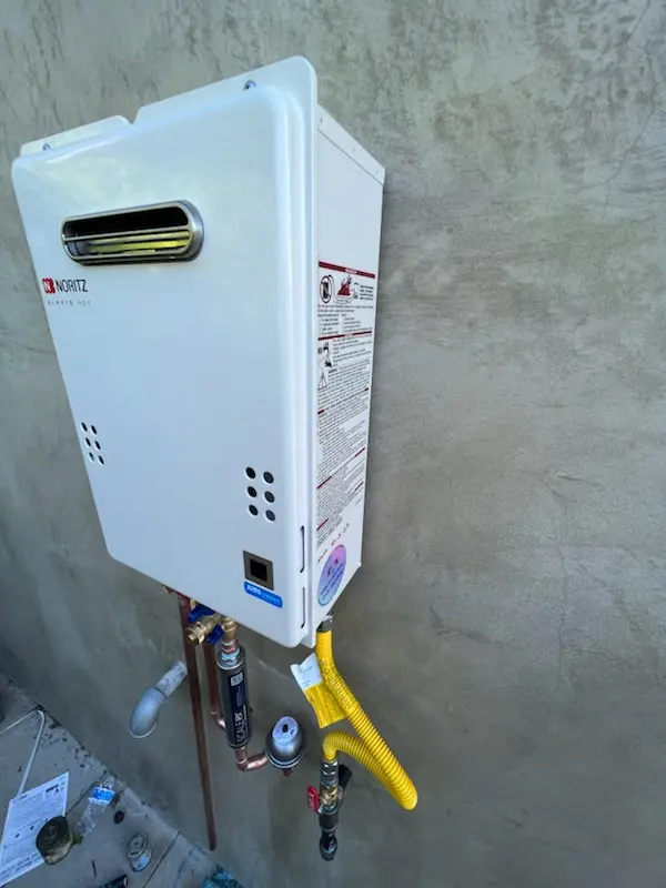 Tankless water heater installation for Town Hall homes